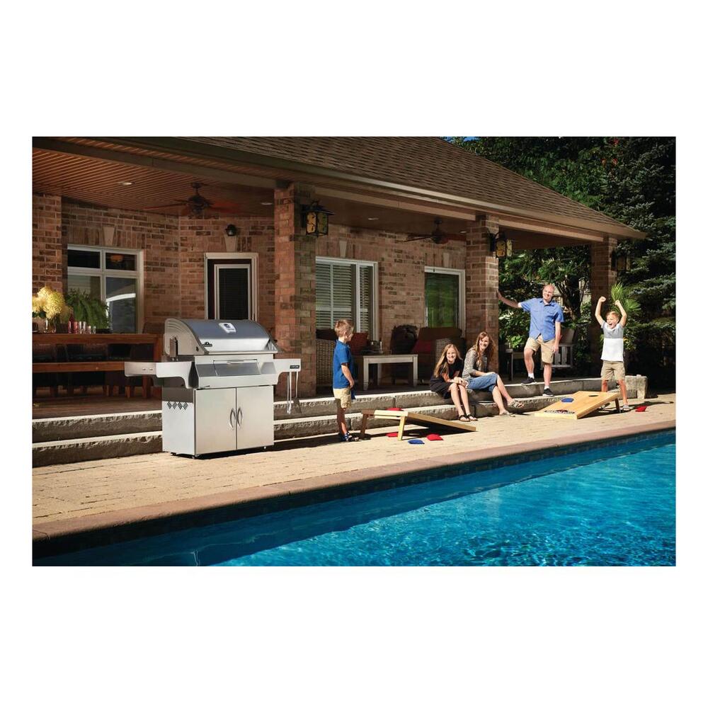 Napoleon PRO605CSS Professional 605 68 inch Freestanding Charcoal Grill with 850 sq. in Cooking Area, Integrated Tool Hooks, Two Charcoal Dividers, Chrome Plated Handles, in Stainless Steel