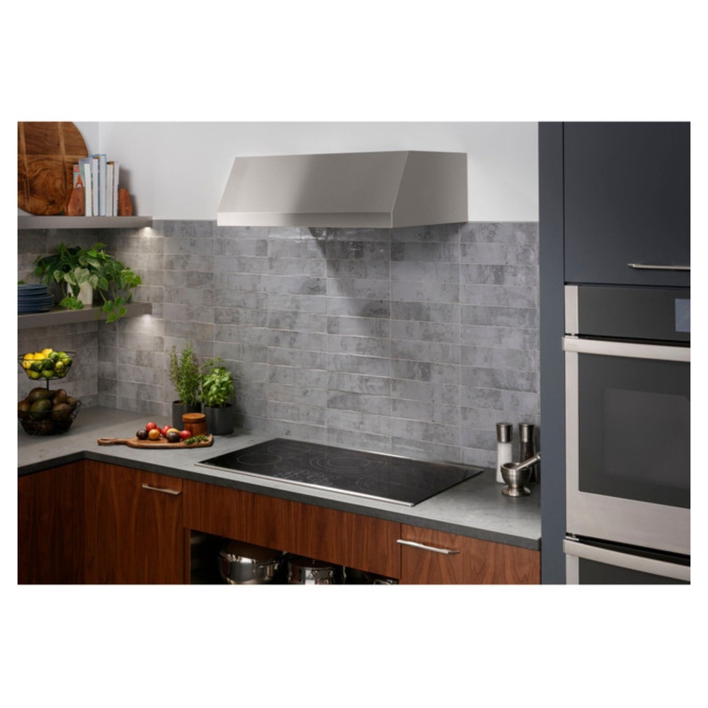 GE-PEP7036DTBB-Modern Kitchen with Built-In Electric Cooktop and Range Hood