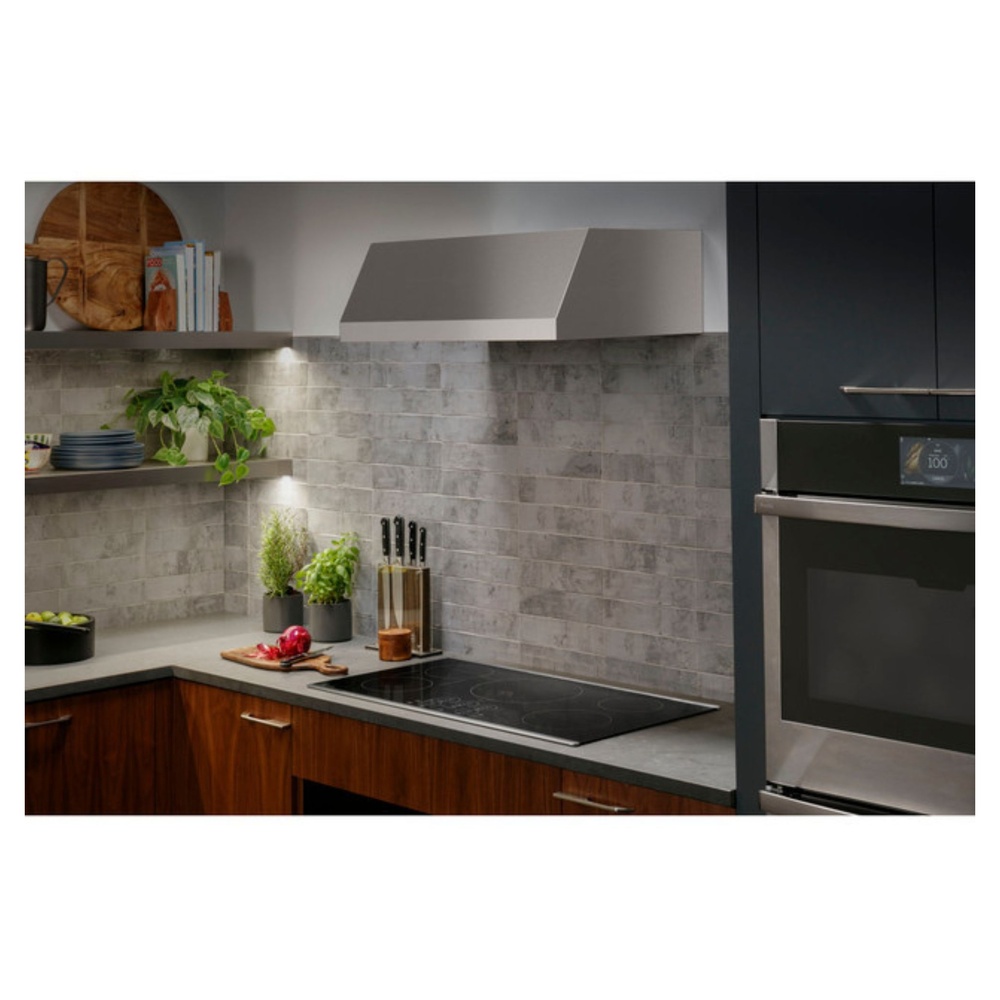 GE-PHP9036DTBB-Modern kitchen with an induction cooktop and range hood
