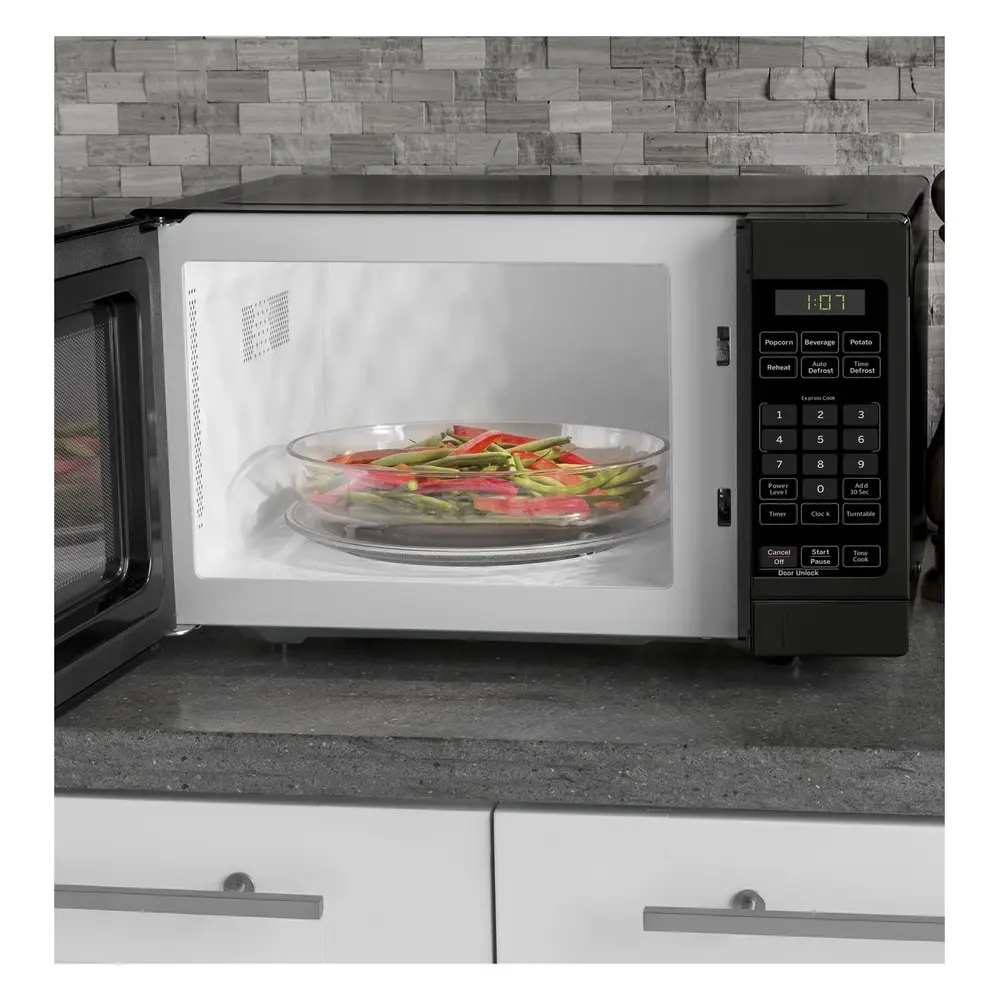 GE GCHK07N1W Spacemaker Countertop Microwave Oven with 0.7 cu. ft. Capacity, 700 Watts, 10 Power Levels