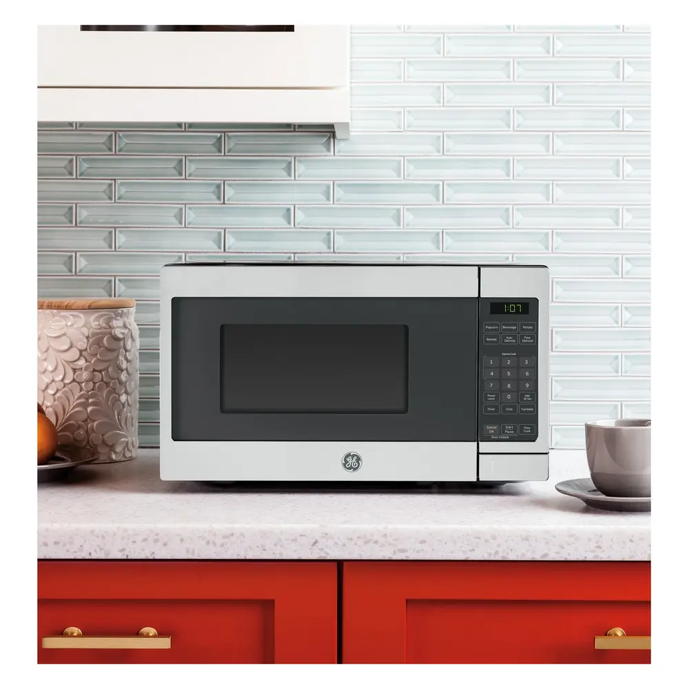 GE GCHK07N1W Spacemaker Countertop Microwave Oven with 0.7 cu. ft. Capacity, 700 Watts, 10 Power Levels