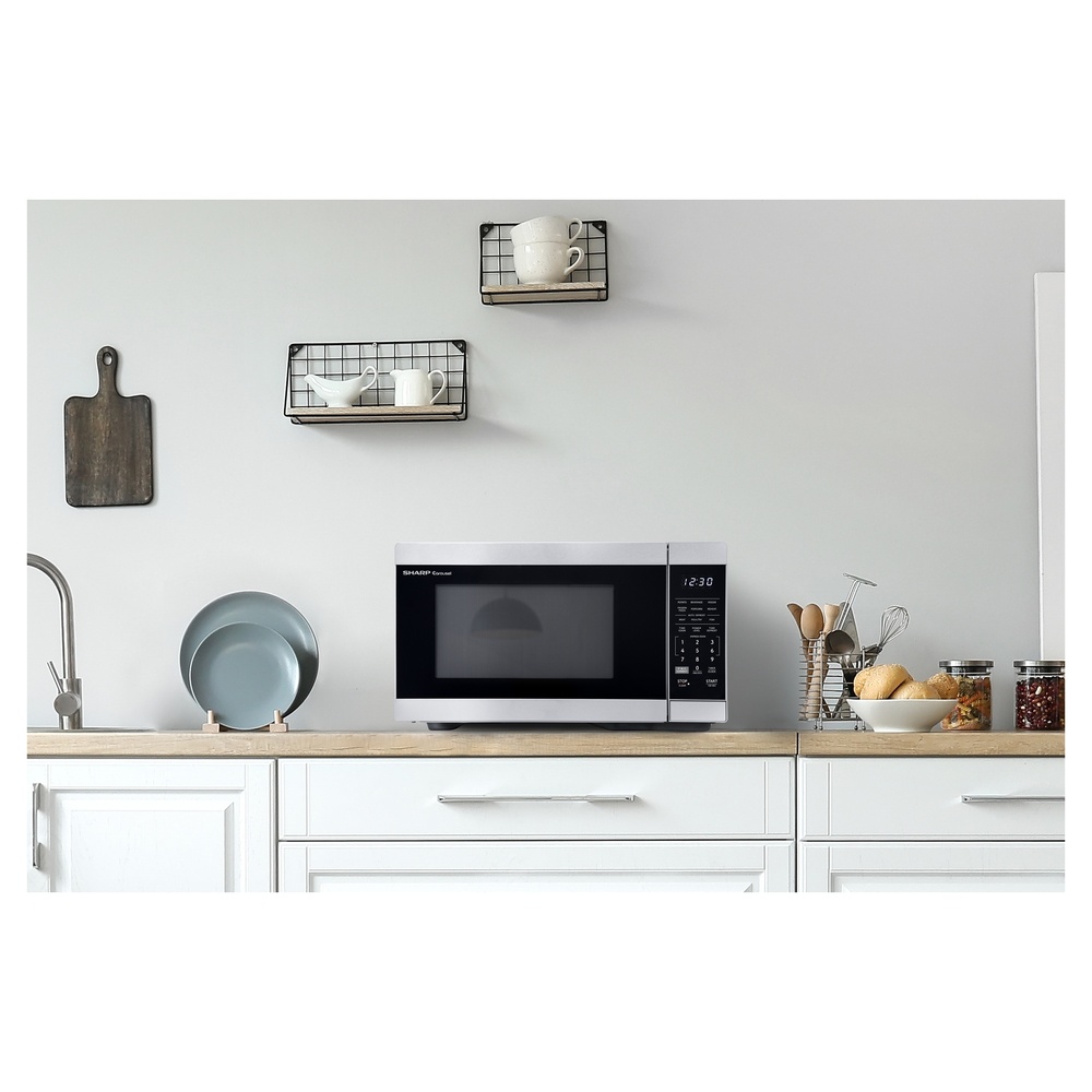 Sharp SMC1162KS 21 inch Countertop Microwave with 1.1 cu. ft. Capacity, Orville Redenbacher’s Certified, 1000 Watts Cooking Power, LED Interior Lighting and Carousel Turntable in Stainless Steel